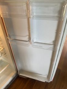 Smeg fridge freezer dairy shelf