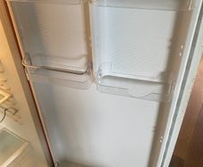 Smeg fridge freezer dairy shelf
