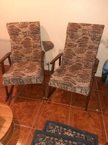 Pair of vintage rocking armchairs