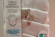 4 brand new Newborn Bodysuits