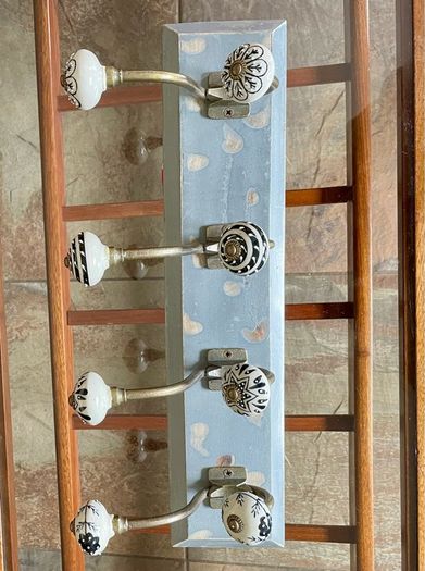 New Unused Stylish Entryway Mounted Ceramic and Brass Coat Hanger