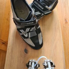 Cycling shoes and pedals