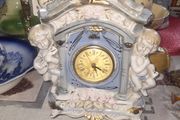 Porcelain Mantel Clock with Two Cherubs and Two Doves on top, and floral accents, Postage Available