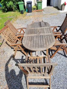 Teak garden extending table and 6 reclining chairs