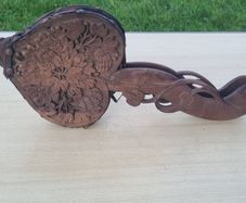 Vintage wooden ornately carved fireplace blower