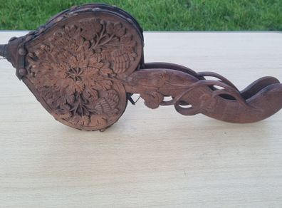 Vintage wooden ornately carved fireplace blower