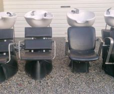 Hair salon sinks and chirs and treatment table