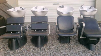 Hair salon sinks and chirs and treatment table