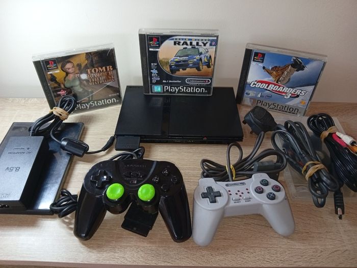 Ps2 Slim With Controllers And Both Ps1 And Ps2 Games And Memory Card