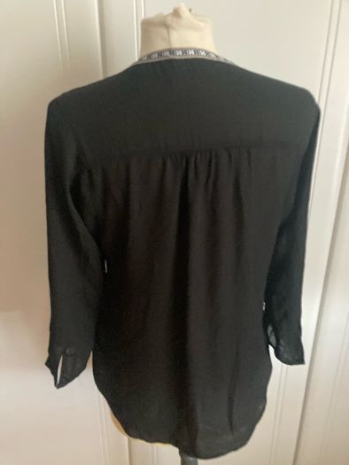 Daniel Rainn top