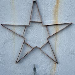 Vintage star lights frame iron construction.