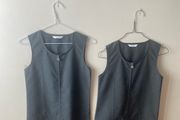 2 M&amp;S grey pinafores (as new) age 9-10