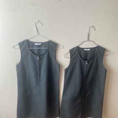 2 M&S grey pinafores (as new) age 9-10