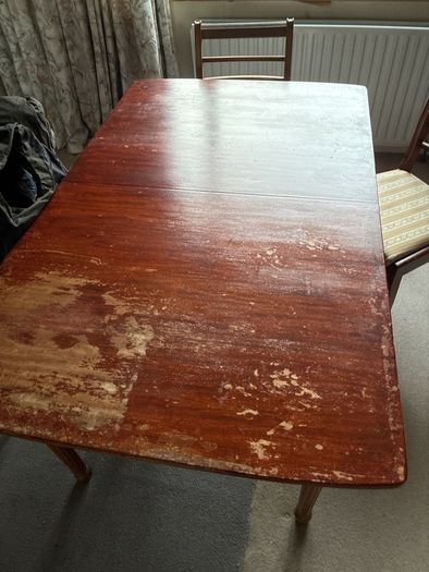 mahogany dining table and 3 chairs