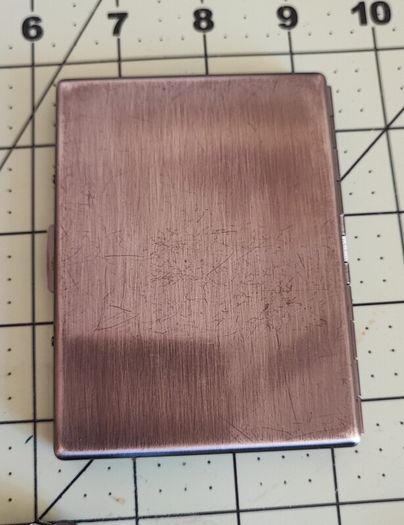 Old Zippos, Zippo flints, and a steel smokes case
