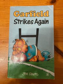 Cartoon book: 'Garfield Strikes Again'
