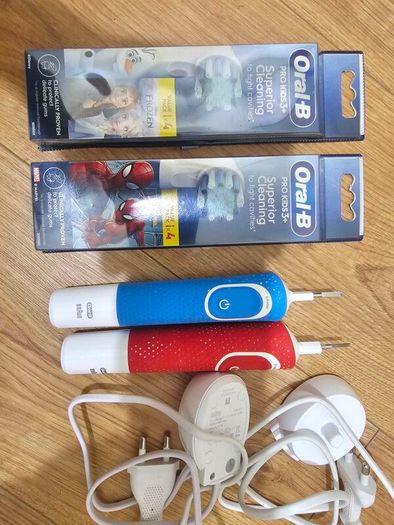oral b kids electric toothbrush x 2 With charger and 8 brand new heads