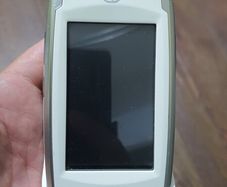 GolfBuddy Platinum GPS navigator featuring a touchscreen interface