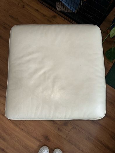 Cream leather pouffe