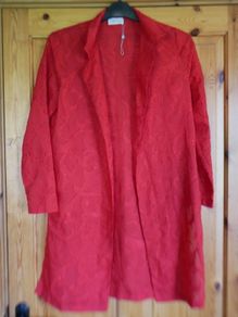 Ladies edge to edge top. Size 10. New. Red