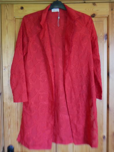 Ladies edge to edge top. Size 10. New. Red