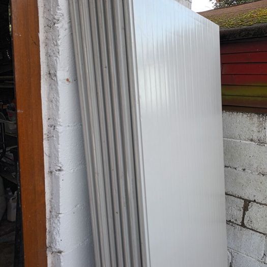 Insulated wall and roof panels