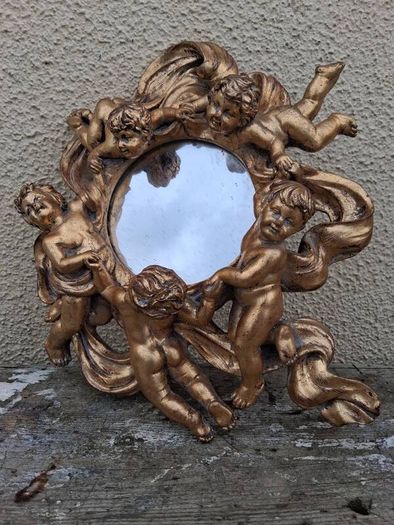 baroque cherub mirror