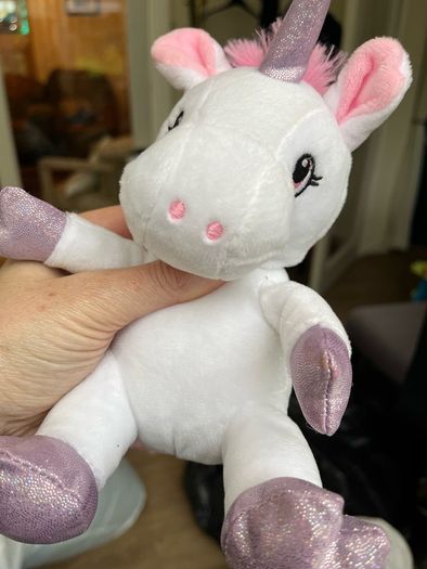 Cuddly white and pink unicorn