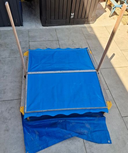 sand pit with canopy roof