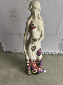 Benaya by innovation porcelain lady with bird signed 2006 floral figurine. have procken finger show photo No. 2 and 4.
