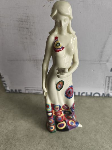 Benaya by innovation porcelain lady with bird signed 2006 floral figurine. have procken finger show photo No. 2 and 4.