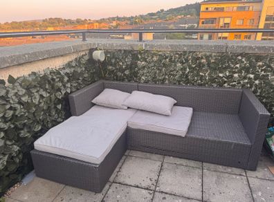 Garden sofa with cushions