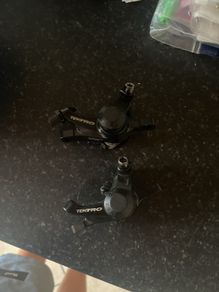 Two tektro mechanical brake callipers
