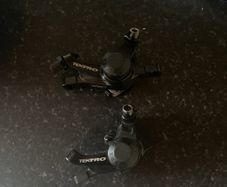 Two tektro mechanical brake callipers
