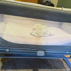 baby bed beside crib