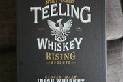 Empty teeling whiskey box and L tee shirt