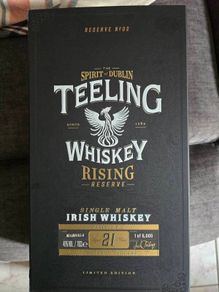 Empty teeling whiskey box and L tee shirt
