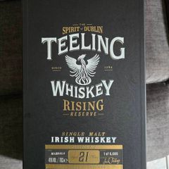 Empty teeling whiskey box and L tee shirt