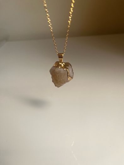 Costume necklace with stone pendant