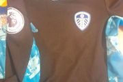 leeds United Age 7/8 goalkeeper shirt and shorts