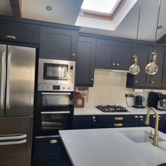 Kitchen units, island and quartz worktops.