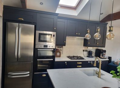 Kitchen units, island and quartz worktops.