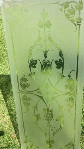 Acid etched glass panel