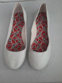 New white flat shoes