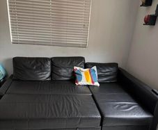 Leather corner sofa  bed with a storage