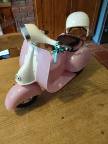 Our Generation 3 wheel scooter with helmet. Like new.