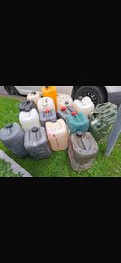 2Jerry cans and 14 Diesel drums