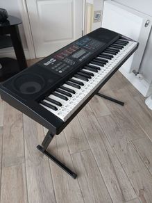 keyboard: never used, with charger and earphones stand