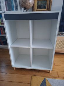 White storage cabinet with four compartments