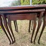 A vintage glass-protected, gold-tooled, leather top nest of tables Image 3